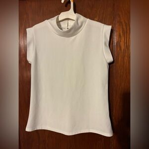 Sleeveless mock neck top with pearl-look neck buttons